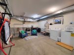Basketball Hoop and Washer and Dryer in Garage